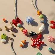 Sets d'inspiration Créez des bijoux estivaux  avec des breloques en verre