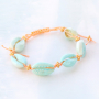 Bijoux tropicaux avec coquillages Cauri