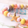 Bijoux de plage avec perles en bois, perles coquillage et m&eacute;tal DQ !
