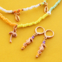 Ces bijoux ont &eacute;t&eacute; confectionn&eacute;s avec la collection estivale de m&eacute;tal DQ :
