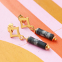 D&eacute;couvrez comment combiner vos boucles d&rsquo;oreilles DQ branch&eacute;es avec des breloques 