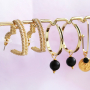 D&eacute;couvrez comment combiner vos boucles d&rsquo;oreilles DQ branch&eacute;es avec des breloques 