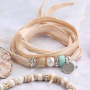 Confectionner des bracelets et des colliers estivaux avec diverses perles en c&eacute;ramique DQ grecque 