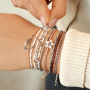 Collection de bracelets &eacute;l&eacute;gants avec des perles h&eacute;matites