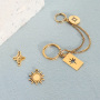 Cr&eacute;ation de bijoux pour elle et pour lui avec breloques en acier inox