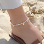 Lancez-vous avec les breloques d'&eacute;t&eacute; DQ pour une collection de plage ultime.