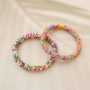 Comment incorporer les boucles d'oreilles &agrave; facettes et les bracelets dans votre collection ?