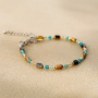 Cr&eacute;ez de magnifiques bijoux avec les perles en verre &agrave; bord dor&eacute;