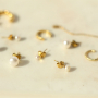 Comment pr&eacute;senter des boucles d'oreilles en acier inoxydable et perles d'eau douce?