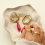 Comment cr&eacute;er des boucles d'oreilles tendance avec des perles en pierre naturelle?