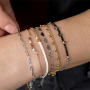 Comment combiner ces bracelets et boucles d'oreilles en acier inoxydable?