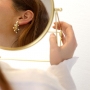 Comment pr&eacute;senter des boucles d'oreilles et bracelets en acier inoxydable?