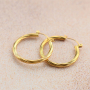 Conseils pour porter des boucles d'oreilles en acier inoxydable