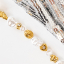 Moment d'inspiration avec des perles et breloques en acier inoxydable